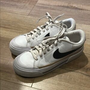 White Sneakers with Black Swoosh